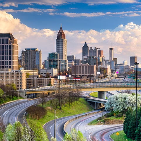 City skyline of Atlanta with cars on a highway