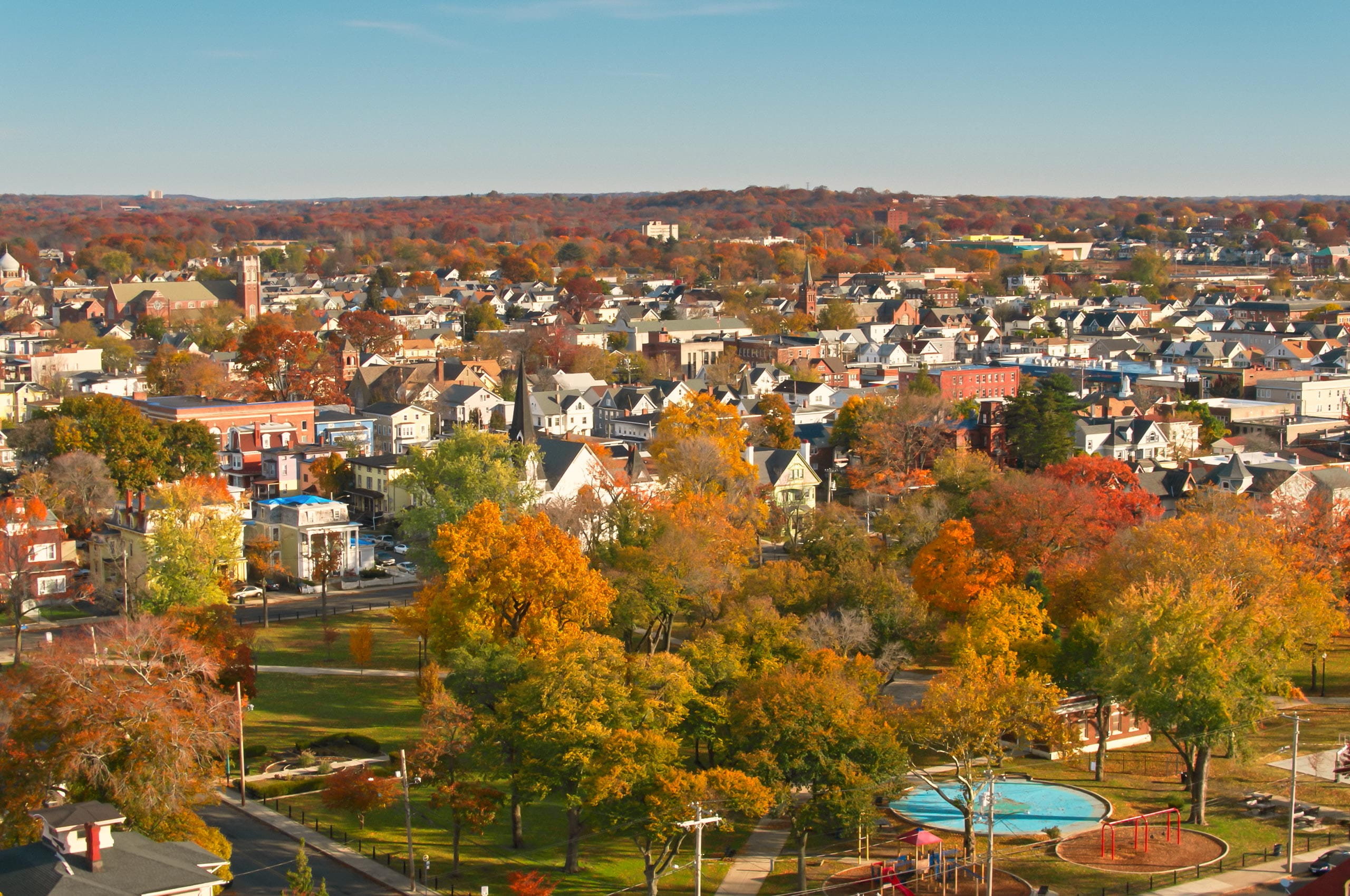 Ovrview of a charming town with colorful buildings and cobblestone streets.