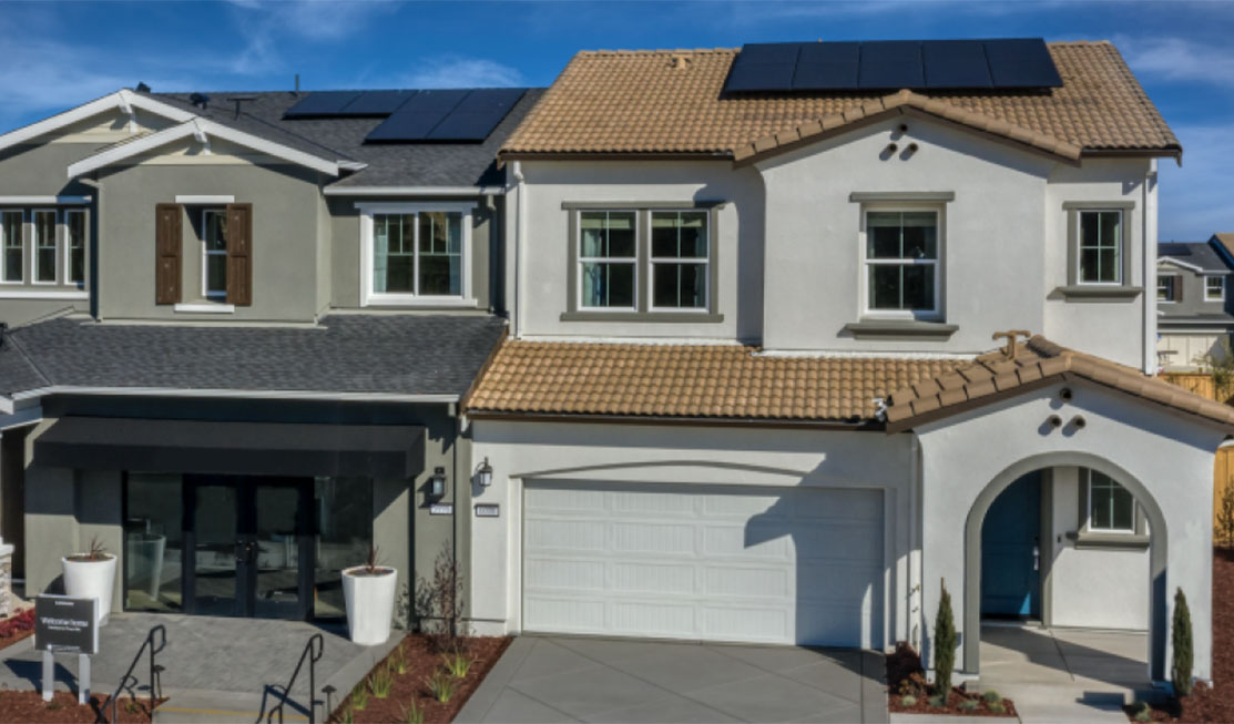 duplex with solar panels on roof