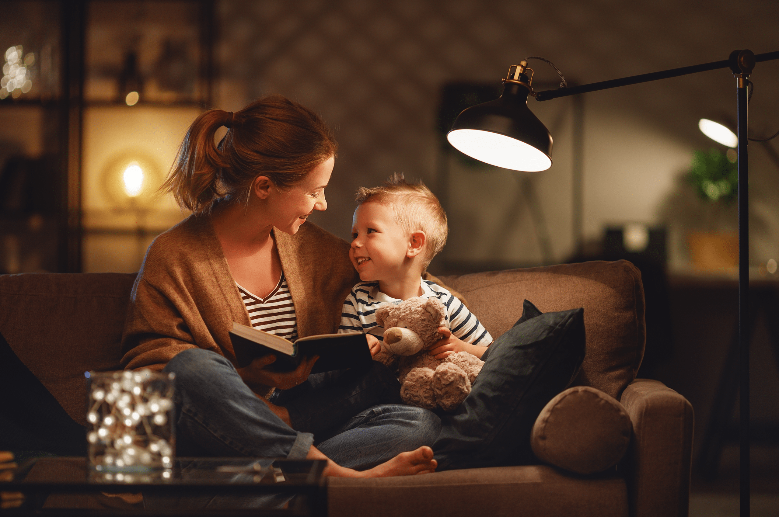 Woman with son sitting on couch